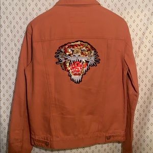Rust colored denim jacket with sequin tiger